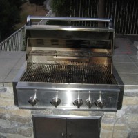 Photo Thumbnail #11: 4 burner w/ rotisserie stainless steel grill.