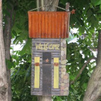 Photo Thumbnail #26: Welcome sign in the tree.