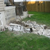 Photo Thumbnail #8: Breaking up the old porch.