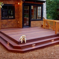 Photo Thumbnail #2: Redwood deck feature step lighting.  Dog is not...