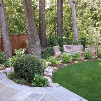 Photo Thumbnail #12: Bluestone walk leads down to firepit area under...