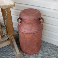 Photo Thumbnail #2: The milk can that I rusted.