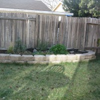 Photo Thumbnail #3: The herb garden looks a little sparse in the...