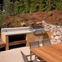 Photo Thumbnail #4: Another view of outdoor kitchen.  Table is...