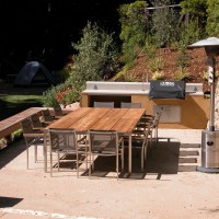 Photo Thumbnail #7: Outdoor kitchen and dining area.