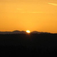 Photo Thumbnail #7: Sunset & mountains seen from our hot tub