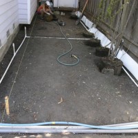 Photo Thumbnail #3: The excavated side yard, with irrigation and...