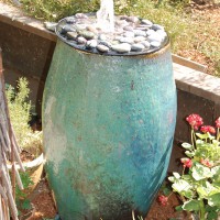 Photo Thumbnail #9: Fountain from a ceramic pot. I dug a hole below...