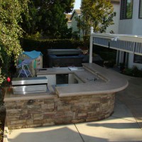 Photo Thumbnail #14: Bar counter of polished poured concrete seats 6...