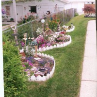 Photo Thumbnail #17: Pond became this 3 part flower bed on the south...