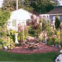 Photo Thumbnail #18: The peace garden contains a birdbath fire pit,...