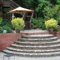 Photo Thumbnail #12: stone steps lead to a patio and stairs to upper...