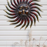 Photo Thumbnail #6: New metal sun for the big blank wall of siding...