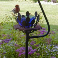 Photo Thumbnail #5: This is an old iron ashtray and lamp stand. You...