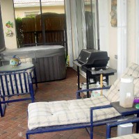 Photo Thumbnail #7: Screened in Porch with Hot Tub