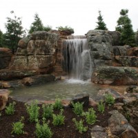 Photo Thumbnail #2: The main waterfalls and the rocky berm made to...