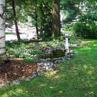 Photo Thumbnail #4: Front yard greenery with bird pond and gazing...