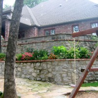 Photo Thumbnail #5: New stone retaining walls replace the original...