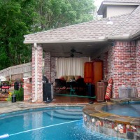 Photo Thumbnail #6: Top porch looks into the kitchen and Tv area.