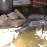 Photo Thumbnail #1: Our new pond! Fountain in the works:) Love the...