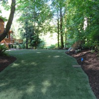 Photo Thumbnail #1: Backyard back end after artificial turf install