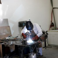 Photo Thumbnail #6: I weld on the shelf rails