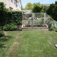 Photo Thumbnail #3: The finished product!  New sod, planter, and...