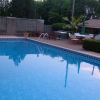 Photo Thumbnail #4: View of pool from left side
sunning area top...