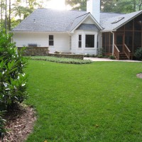 Photo Thumbnail #2: The backyard, after.  We used retaining walls...