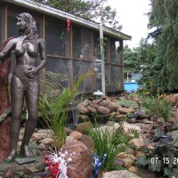 Photo Thumbnail #14: The pond area is under the watchful eye of Eve.  