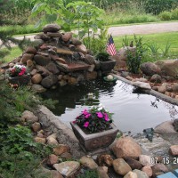 Photo Thumbnail #6: The back pond with the mini waterfall