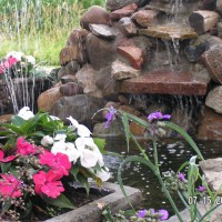 Photo Thumbnail #3: Mini waterfall bursting with colors from the...