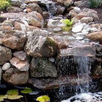 Photo Thumbnail #1: Small series of waterfalls and small pond