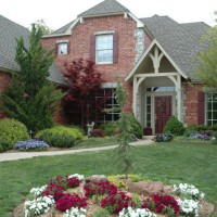 Photo Thumbnail #1: Front yard with fountain with Japanese Red...