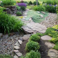 Photo Thumbnail #8: The stone bridge hovers over a dry creek bed...