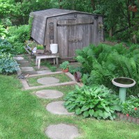 Photo Thumbnail #5: The circular stones lead to our vintage shed...