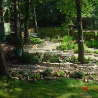 Photo Thumbnail #1: Creek and shade garden, with the water running...