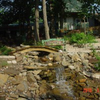 Photo Thumbnail #11: Middle falls and bridge over the creek