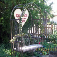 Photo Thumbnail #22: close up of bench and sign looking toward street.