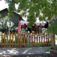 Photo Thumbnail #24: The front area we added geraniums and crepe...