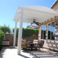 Photo Thumbnail #4: The patio cover supports an outdoor fan.