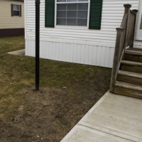Photo Thumbnail #1: Front Yard Left and Partial View of Wood Stairs