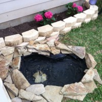 Photo Thumbnail #8: Pond with the flagstone around it. Hydrangea's...