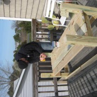 Photo Thumbnail #1: Darrin building me an herb/veggie box from deck...