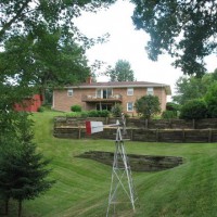 Photo Thumbnail #6: View from the backyard to the house in 2005....