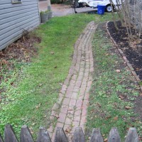 Photo Thumbnail #15: BEFORE: A quaint brick path leading out to the...