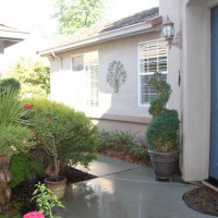 Photo Thumbnail #6: Looking at walkway that leads back to front yard.