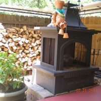 Photo Thumbnail #10: fireplace on additional porch with sitting area