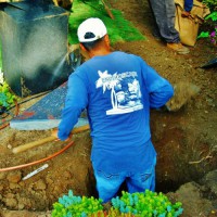 Photo Thumbnail #6: Installing the rainwater diversion box