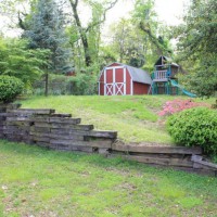 Photo Thumbnail #1: Decaying old retaining wall (very sloped surface)